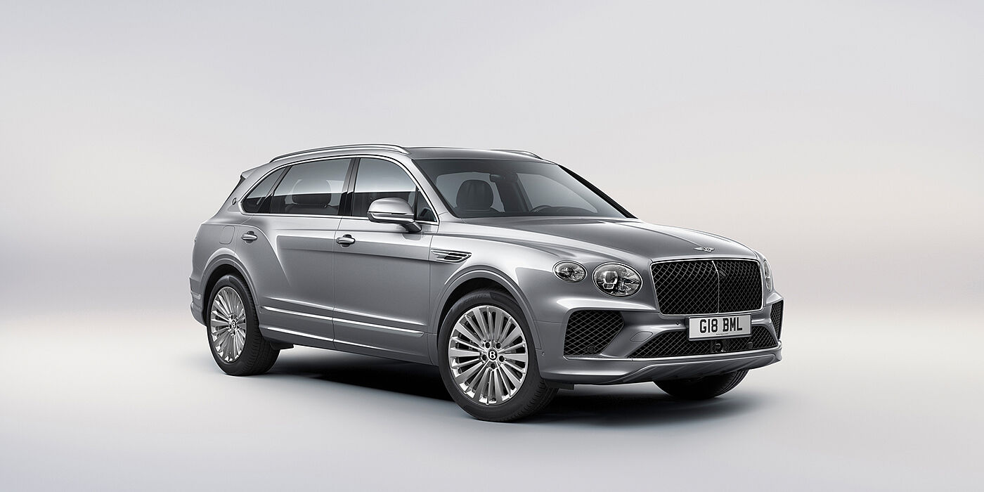 Bentley Copenhagen Bentley Bentayga Extended Wheelbase luxury SUV front three quarter view in Moonbeam paint with 21 inch five spoke painted wheels