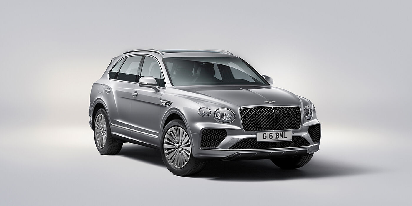 Bentley Copenhagen Bentley Bentayga luxury SUV front three quarter view in Moonbeam paint with matrix grille and 21″ 5 spoke painted wheels