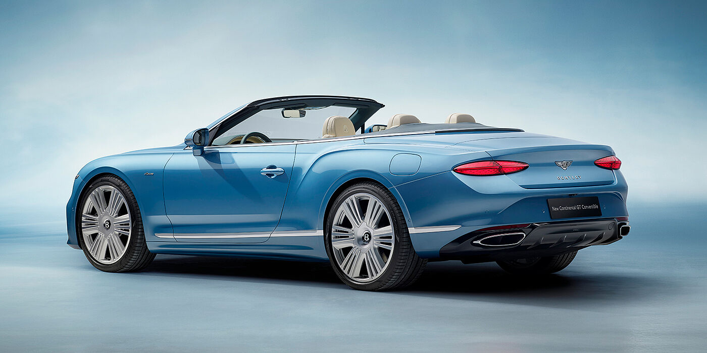 Bentley Copenhagen New Bentley Continental GTC Azure convertible rear view in Light Windsor blue paint with 22 inch ten spoke wheels and chrome exterior details
