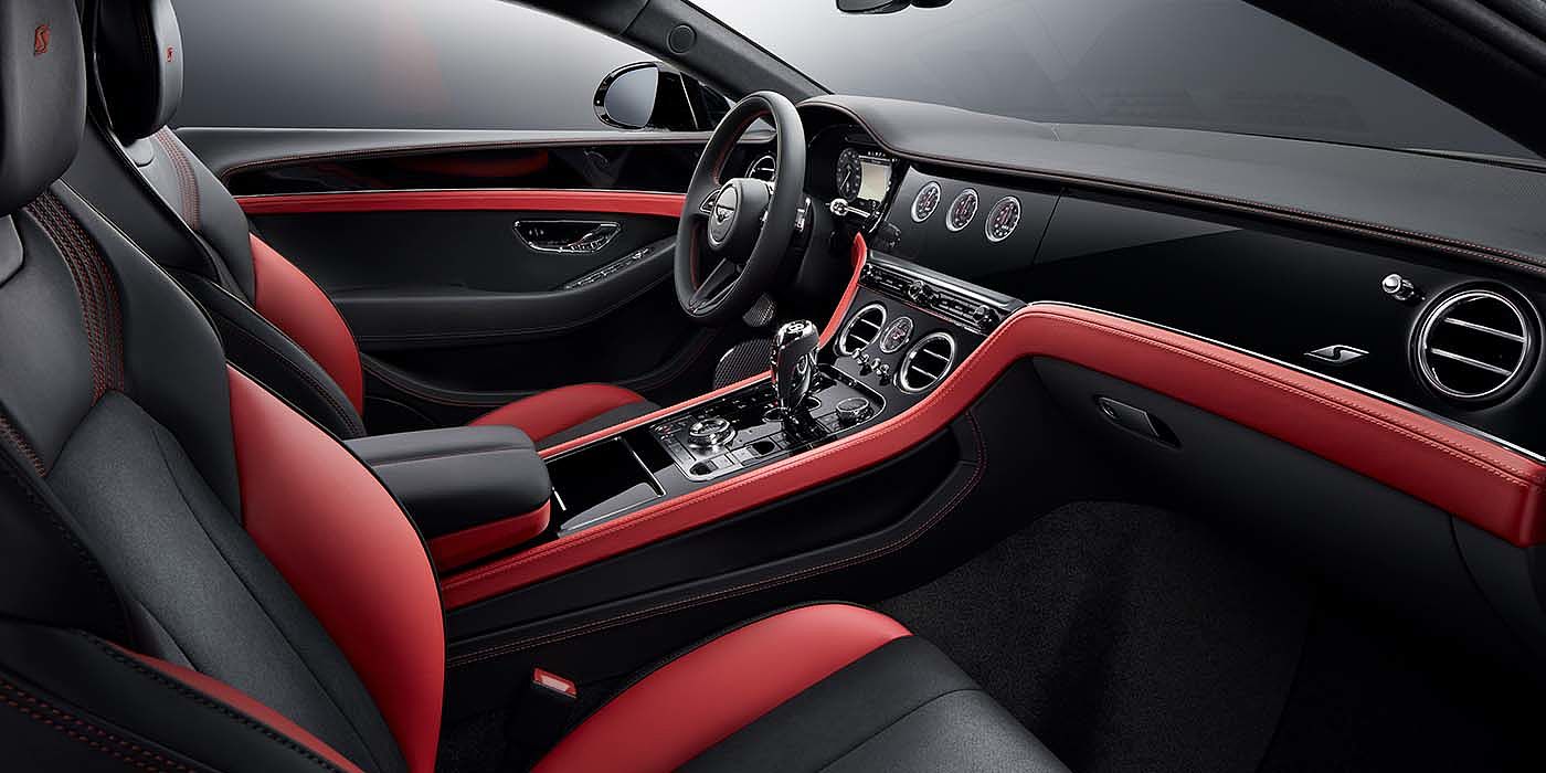 Bentley Copenhagen Bentley Continental GT S coupe front interior in Beluga black and Hotspur red hide with high gloss Carbon Fibre veneer
