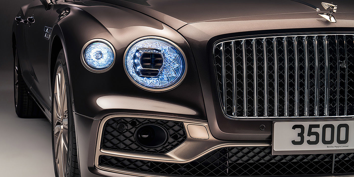 Bentley Copenhagen Bentley Flying Spur Odyssean sedan front grille and illuminated led lamps with Brodgar brown paint