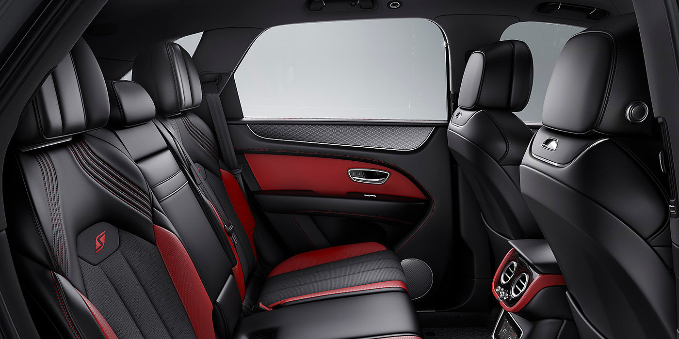 Bentley Copenhagen Bentey Bentayga S interior view for rear passengers with Beluga black and Hotspur red coloured hide.