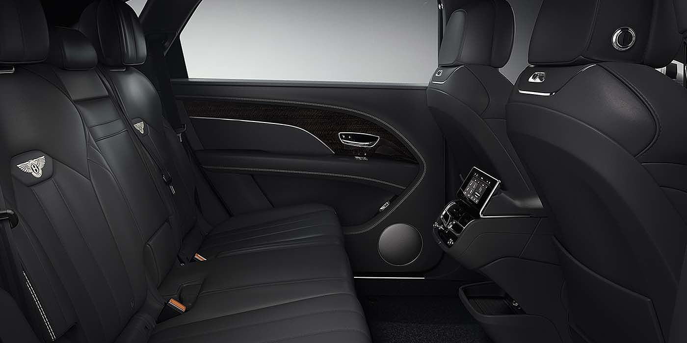 Bentley Copenhagen Bentley Bentayga EWB SUV rear interior in Beluga black leather