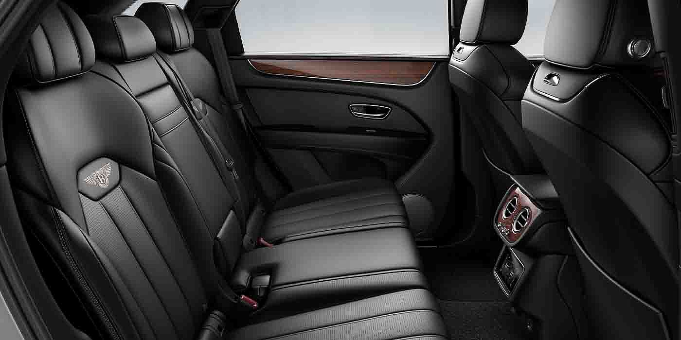Bentley Copenhagen Bentley Bentayga EWB interior view for rear passengers with Beluga black hide.