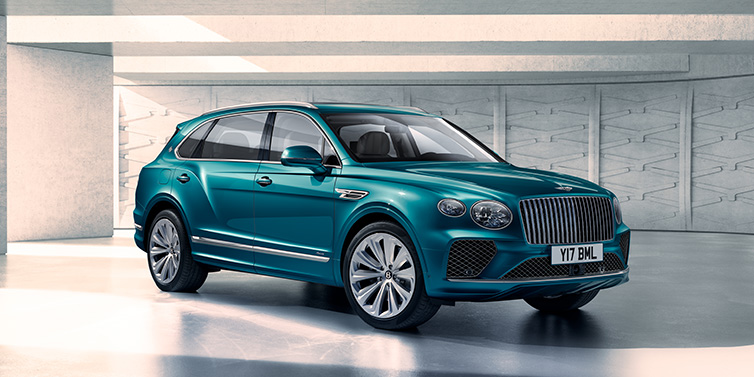 Bentley Copenhagen Bentley Bentayga Extended Wheelbase Azure SUV front three quarter in Topaz blue paint colour with a grey background