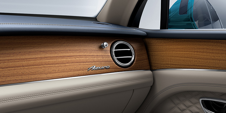 Bentley Copenhagen Bentley Bentayga Extended Wheelbase Azure front dash showing Open Pore Koa veneer surrounded by Portland and Imperial Blue hides