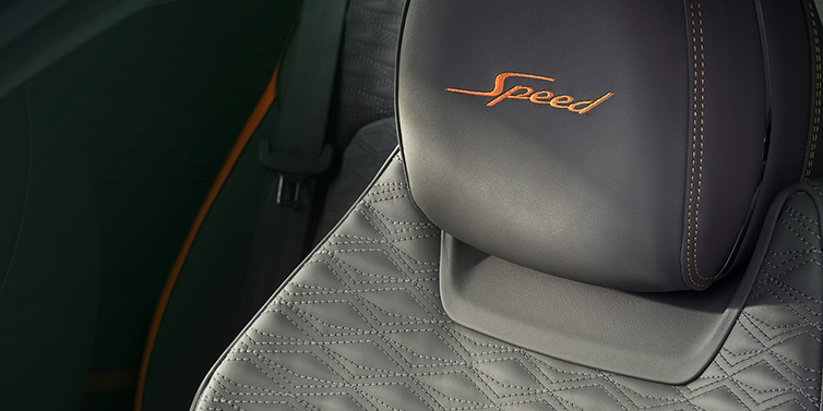 Bentley Copenhagen Bentley Continental GT Speed coupe seat detail in Gravity Grey hide and Speed emblem in Mandarin by Mulliner coloured embroidery